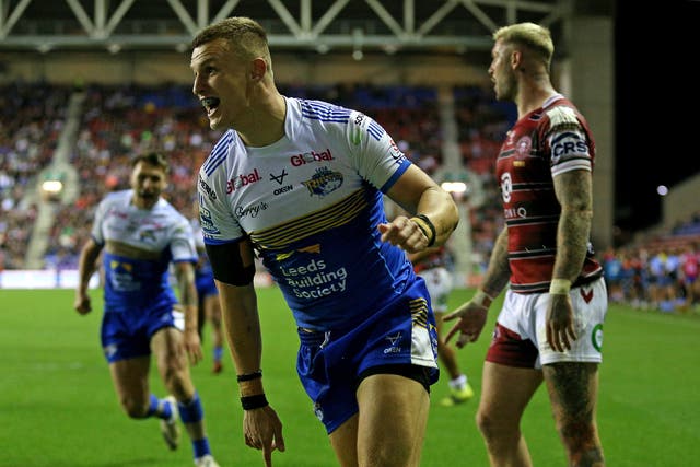 Ash Handley celebrates after scoring Leeds’ try (Nigel French/PA)