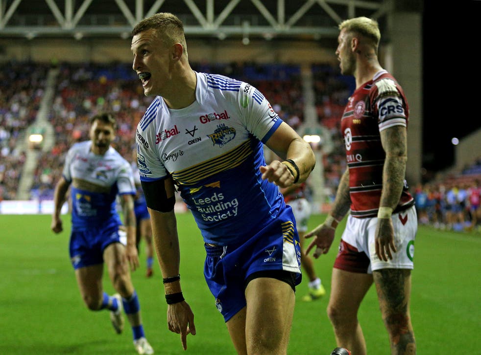 Ash Handley celebrates after scoring Leeds’ try (Nigel French/PA)