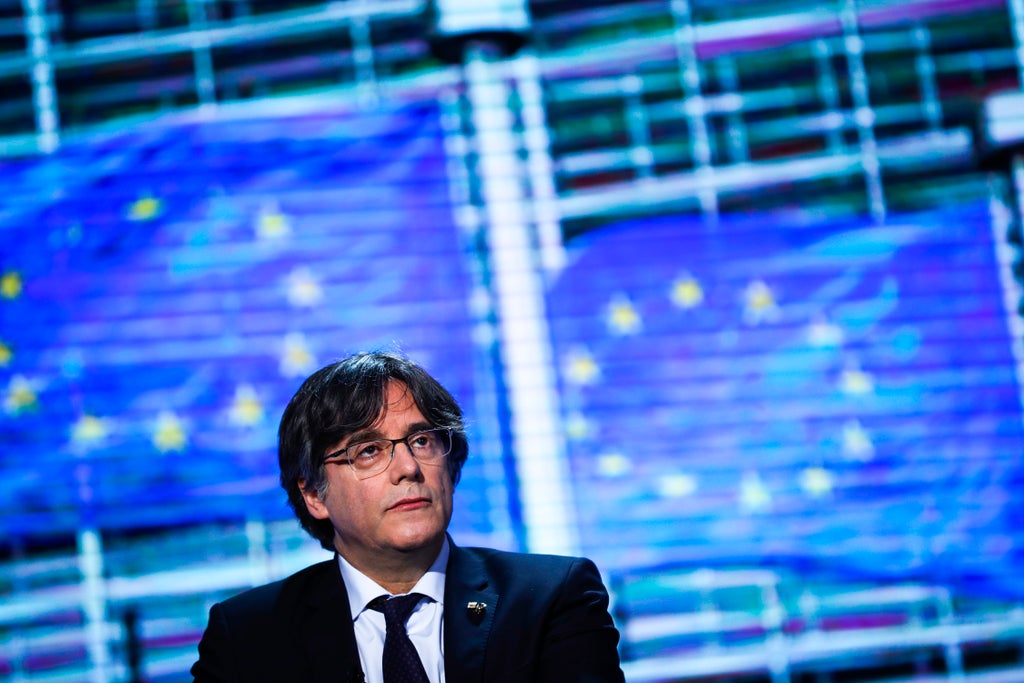 Detained Catalan leader sought by Spain awaits fate in Italy