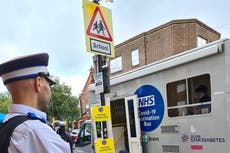 Police protect mobile vaccine units after anti-vaxxers harass staff and public