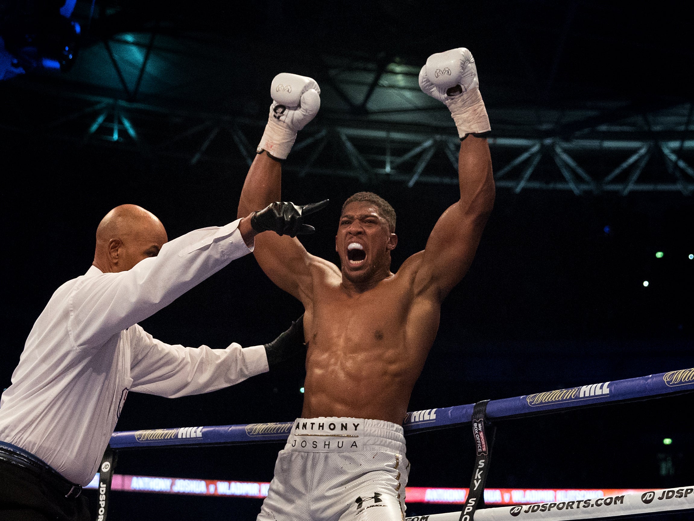 Anthony Joshua celebrates knocking down Wladimir Klitschko