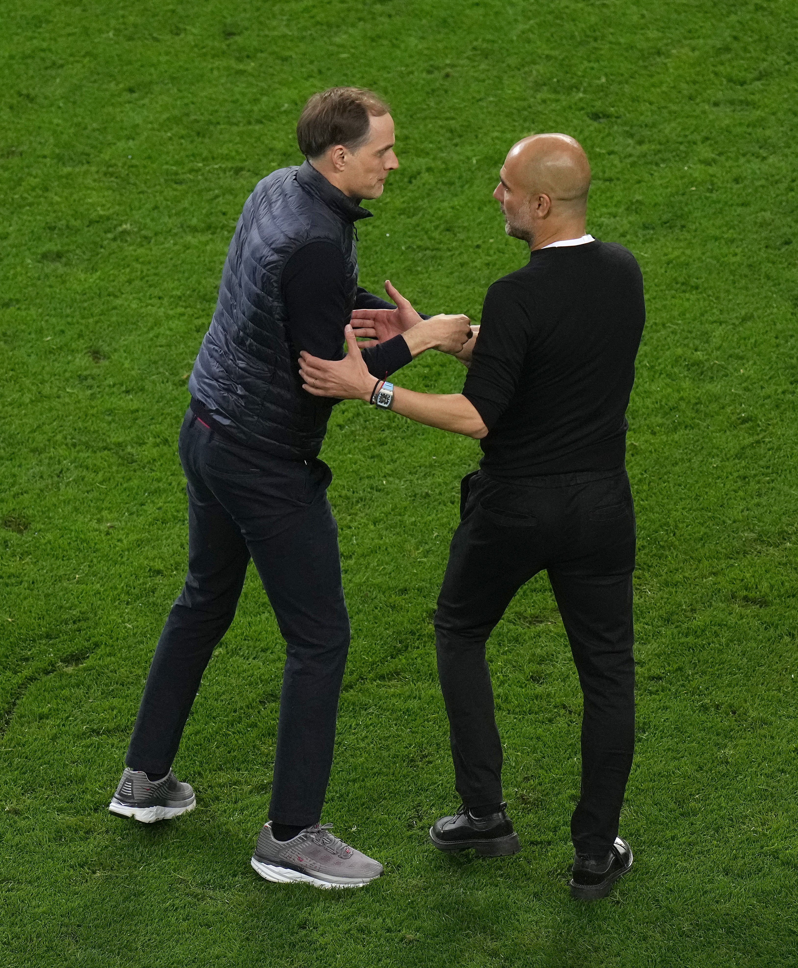 Thomas Tuchel, left, and Pep Guardiola, right, after Chelsea beat Manchester City 1-0 in the 2021 Champions League final (Adam Davy/PA)