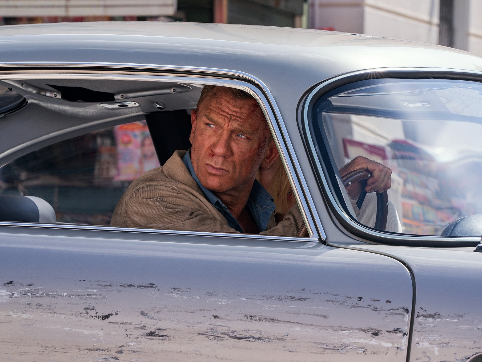 Daniel Craig drives through Italy in a scene from his final Bond film, ‘No Time to Die'