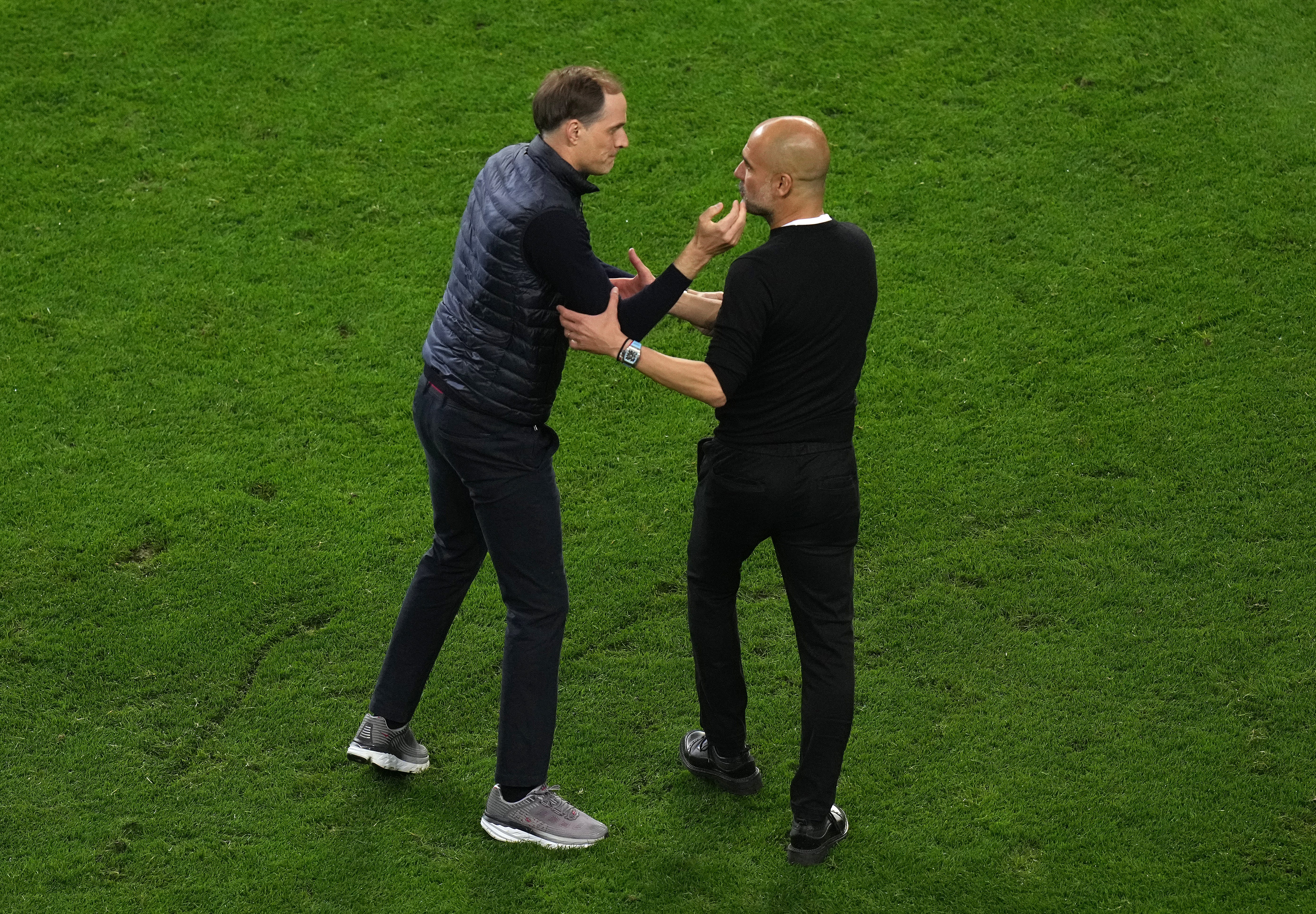 Pep Guardiola, right, is starting from scratch in his Premier League battle with Chelsea boss Thomas Tuchel (Adam Davy/PA)