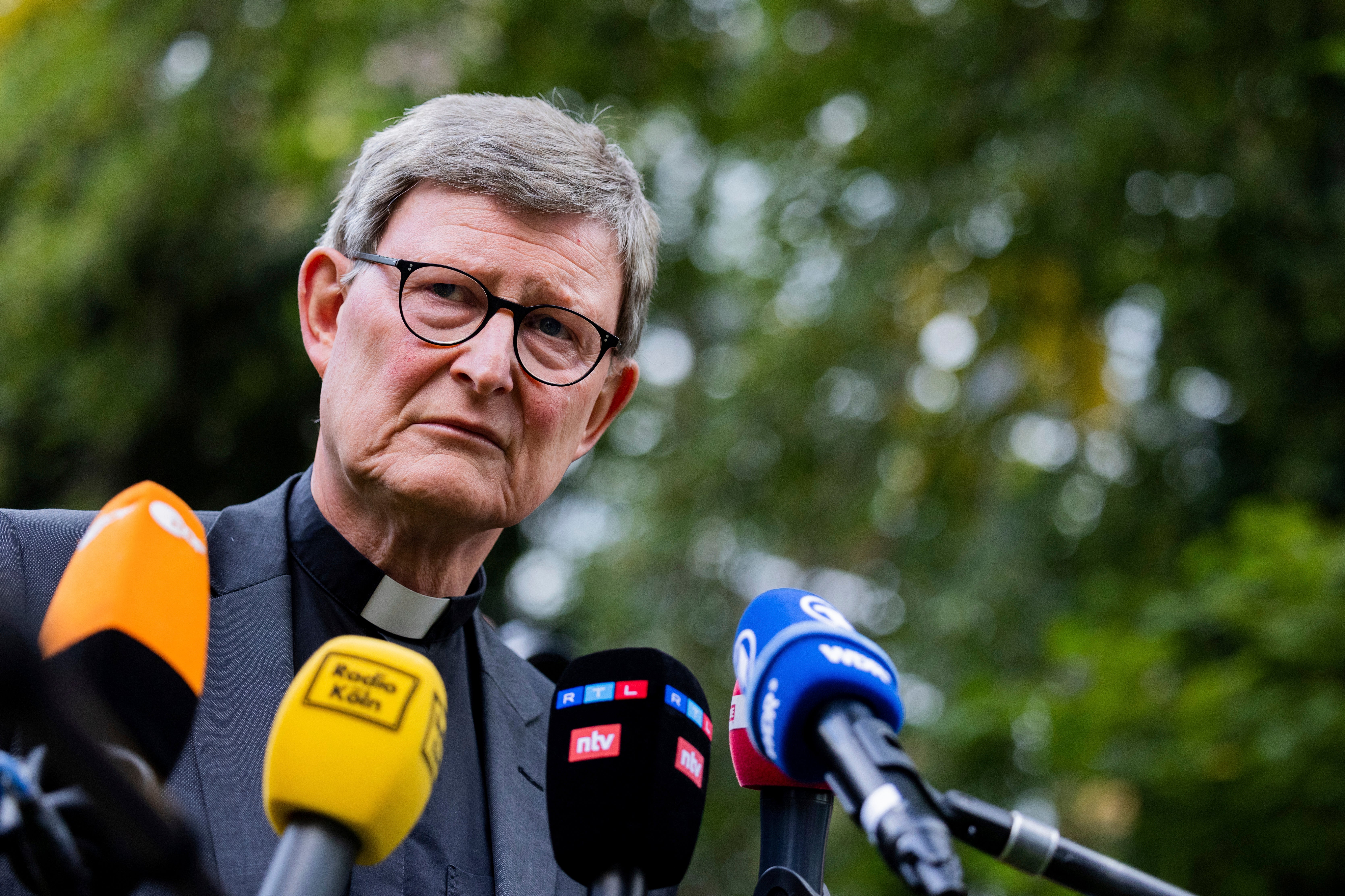 Cardinal Rainer Maria Woelki makes a statement in the garden of the Archbishop's House in Cologne