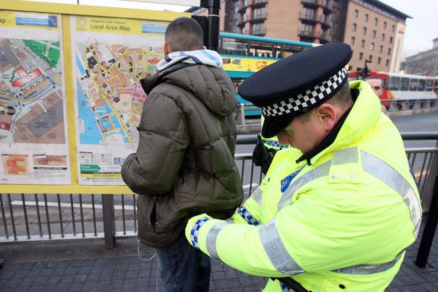<p>Police stop and search Christmas shoppers in Liverpool last month  </p>