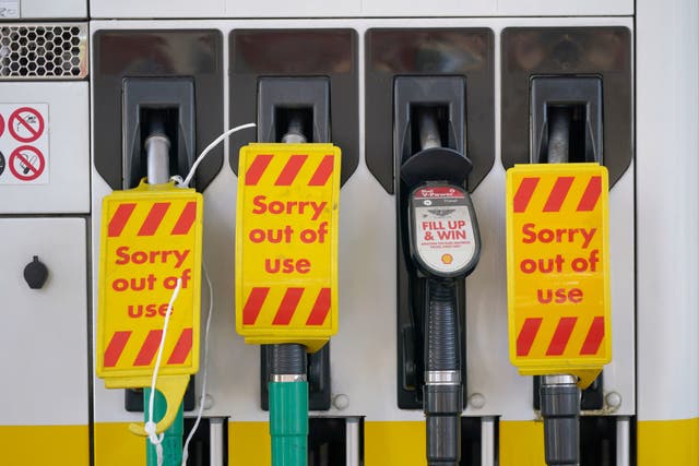 <p>Closed pumps at a Shell garage in Clapham, London as drivers ignore pleas not to panic buy</p>