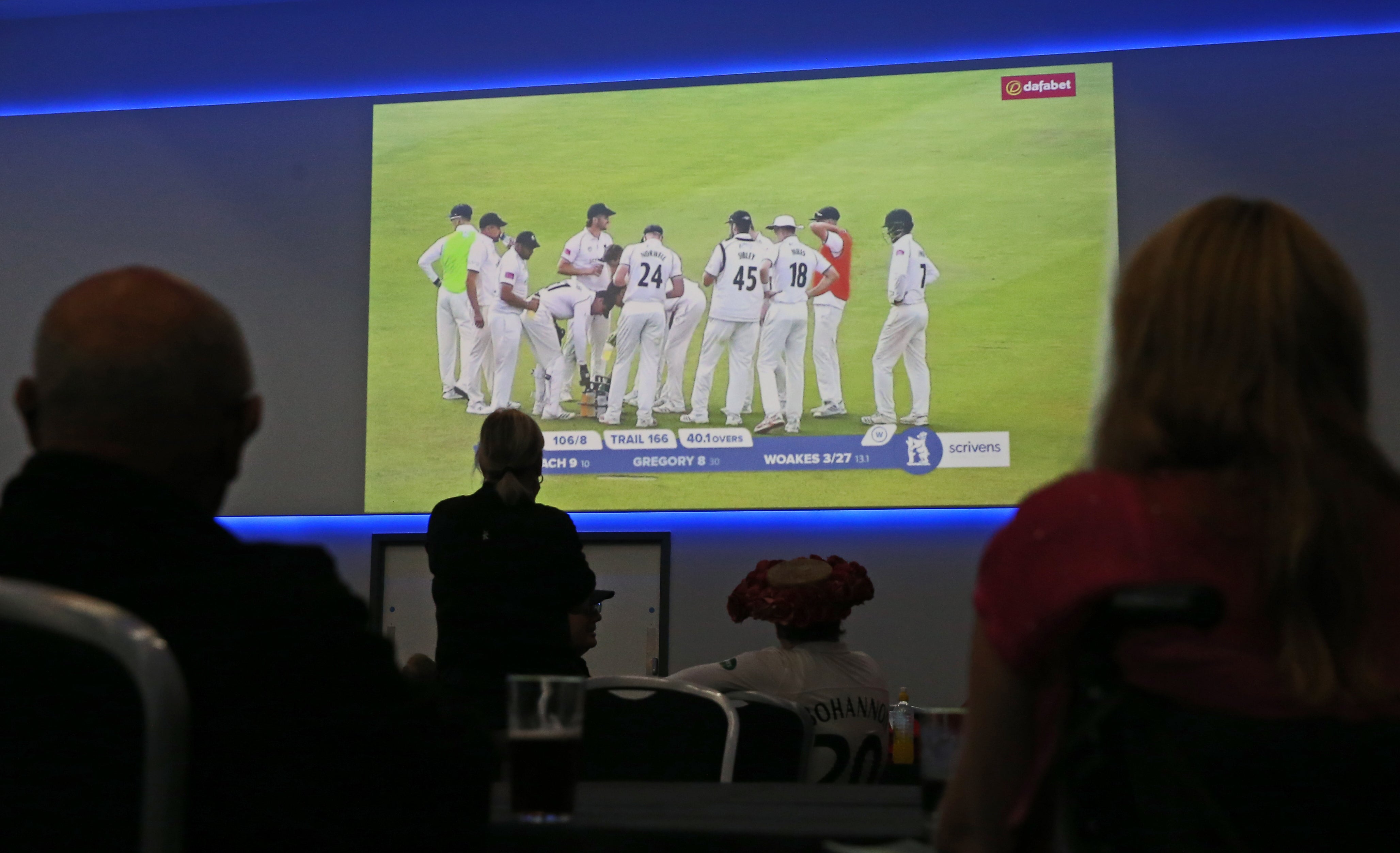 Lancashire fans watch Warwickshire play at Edgbaston on a big screen