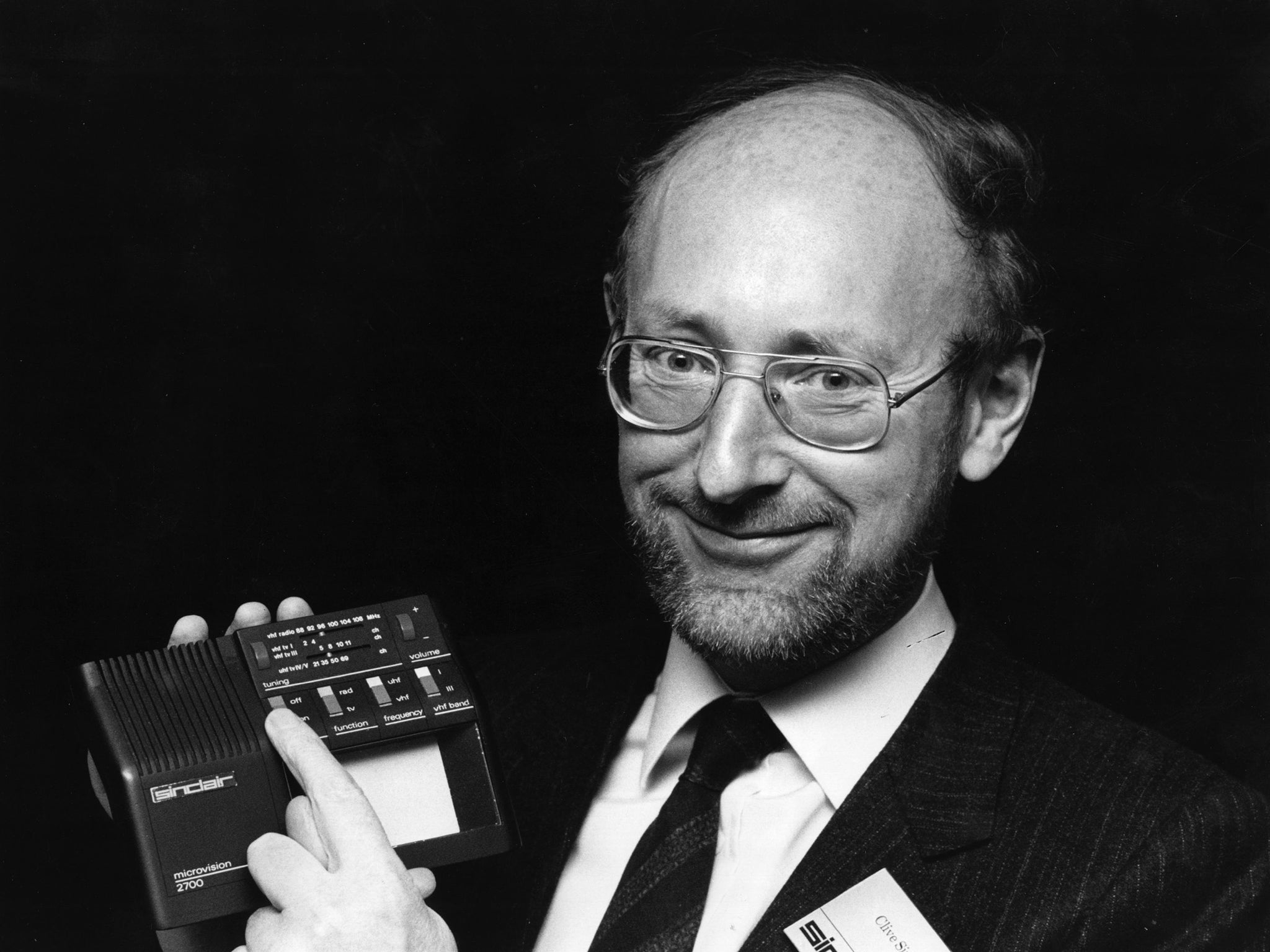 Sir Clive holds a prototype of a new multi-standard flat screen television in 1981