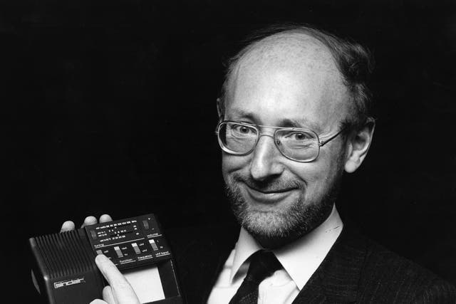 <p>Sir Clive holds a prototype of a new multi-standard flat screen television in 1981 </p>