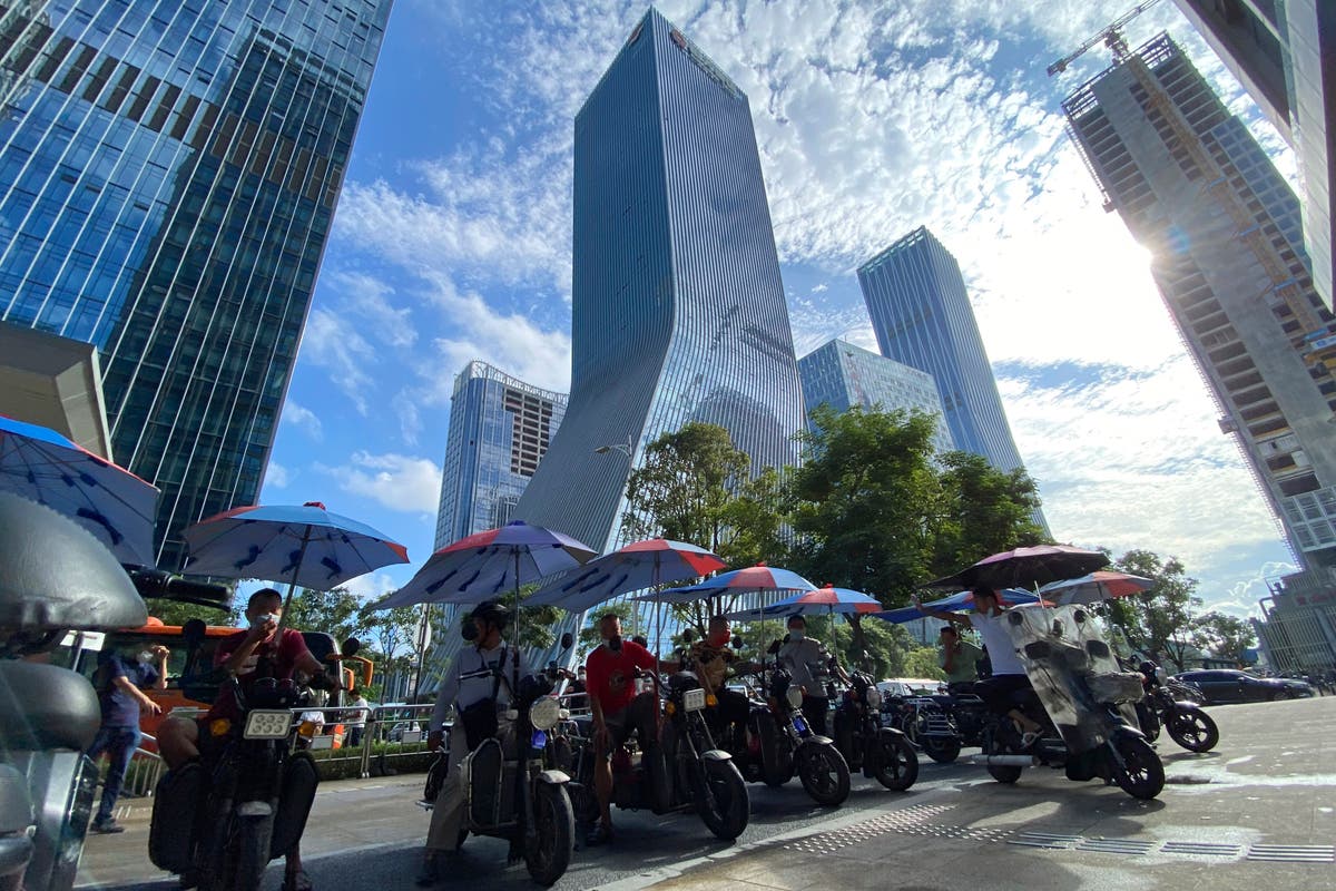 Evergrande shares rise after reports that it had made interest payment before crucial deadline Evergrande shares rise after reports that it had made interest payment before crucial deadline