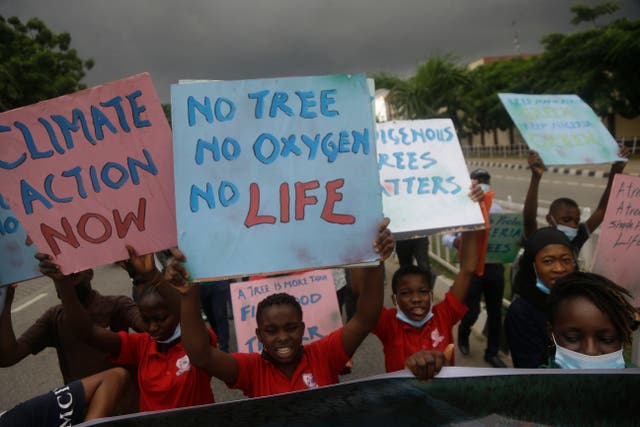 <p>Activists march on the streets of Lagos, Nigeria, on 24 September 2021, demanding action on climate change</p>
