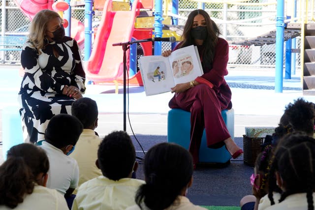 <p>Meghan, the Duchess of Sussex, reads from her book The Bench during her visit with Prince Harry, to PS 123, the Mahalia Jackson School, in New York’s Harlem neighbourhood (Richard Drew/AP)</p>