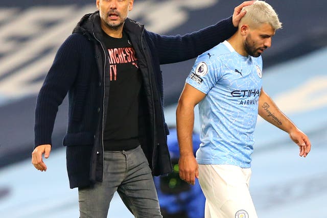 Pep Guardiola, left, acknowledged City are missing something after failing to replace Sergio Aguero this summer (Alex Livesey/PA)