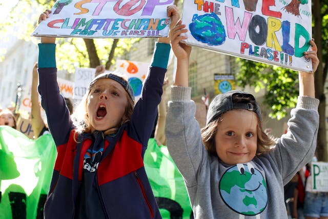 <p>Children join a climate protest in London on  24 September </p>
