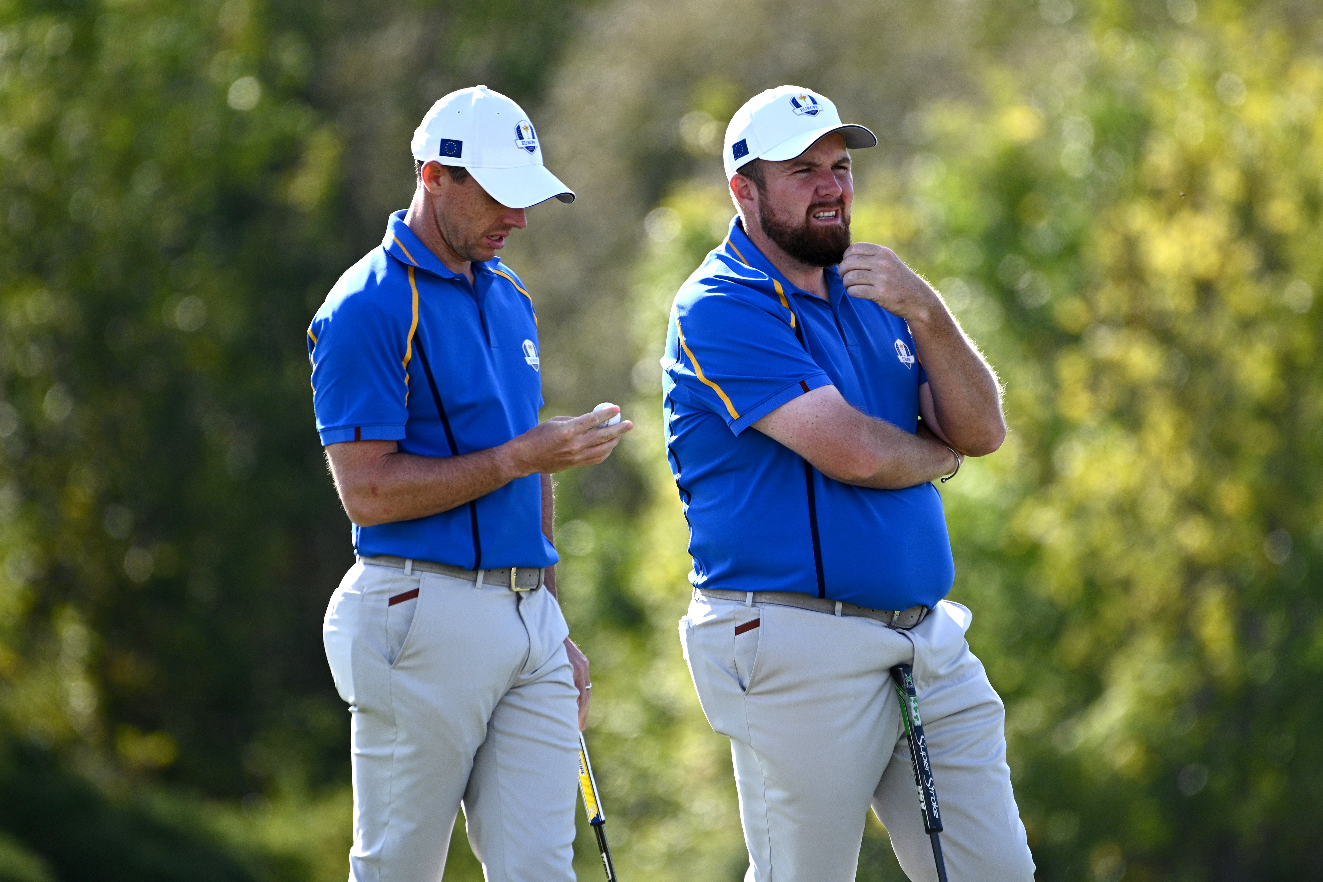 Rory McIlroy (left) and Shane Lowry on the 10th hole during day two of the Ryder Cup (Anthony Behar/PA)