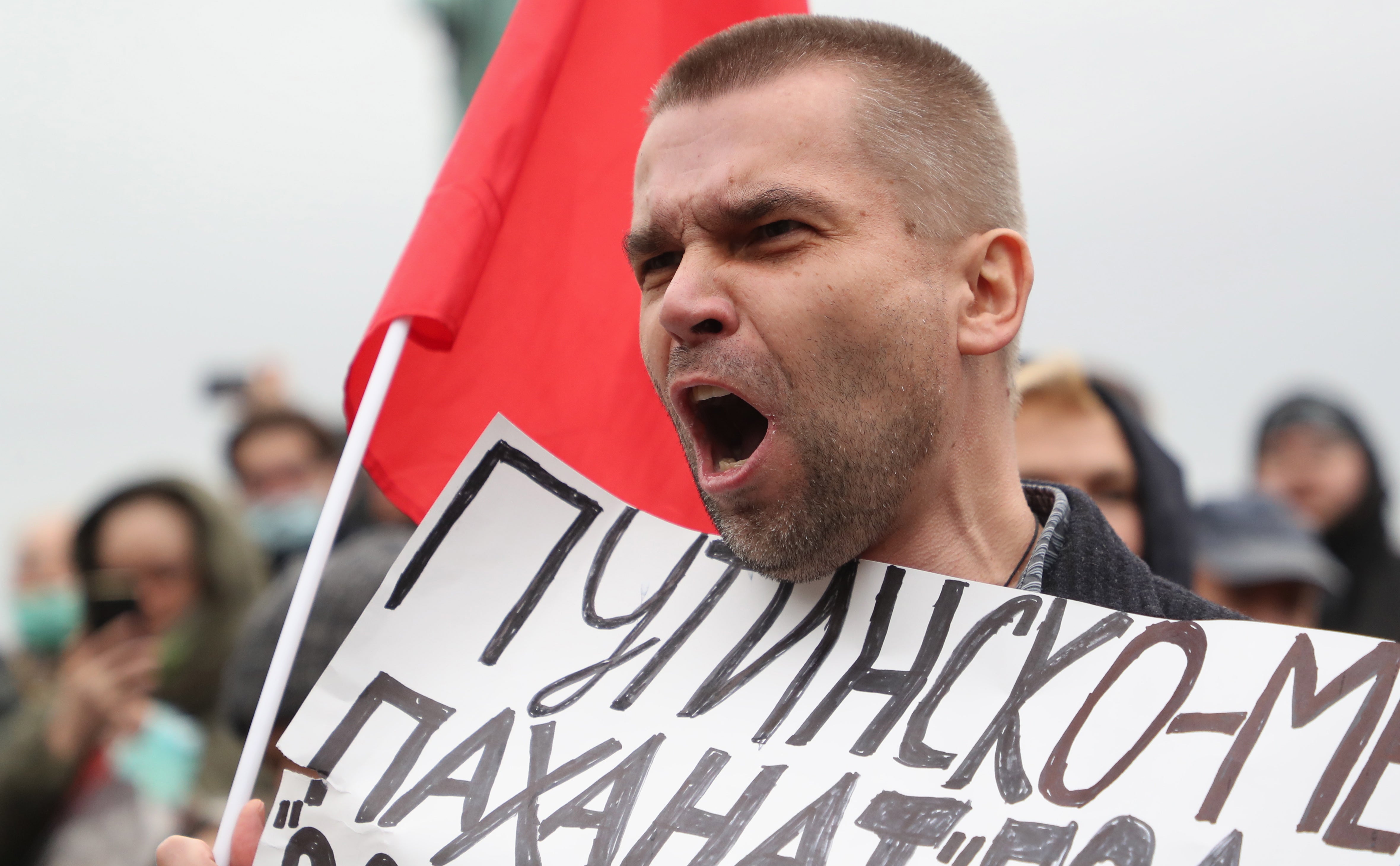 A Russian Communist party supporter at the protest against election fraud in Moscow on Saturday