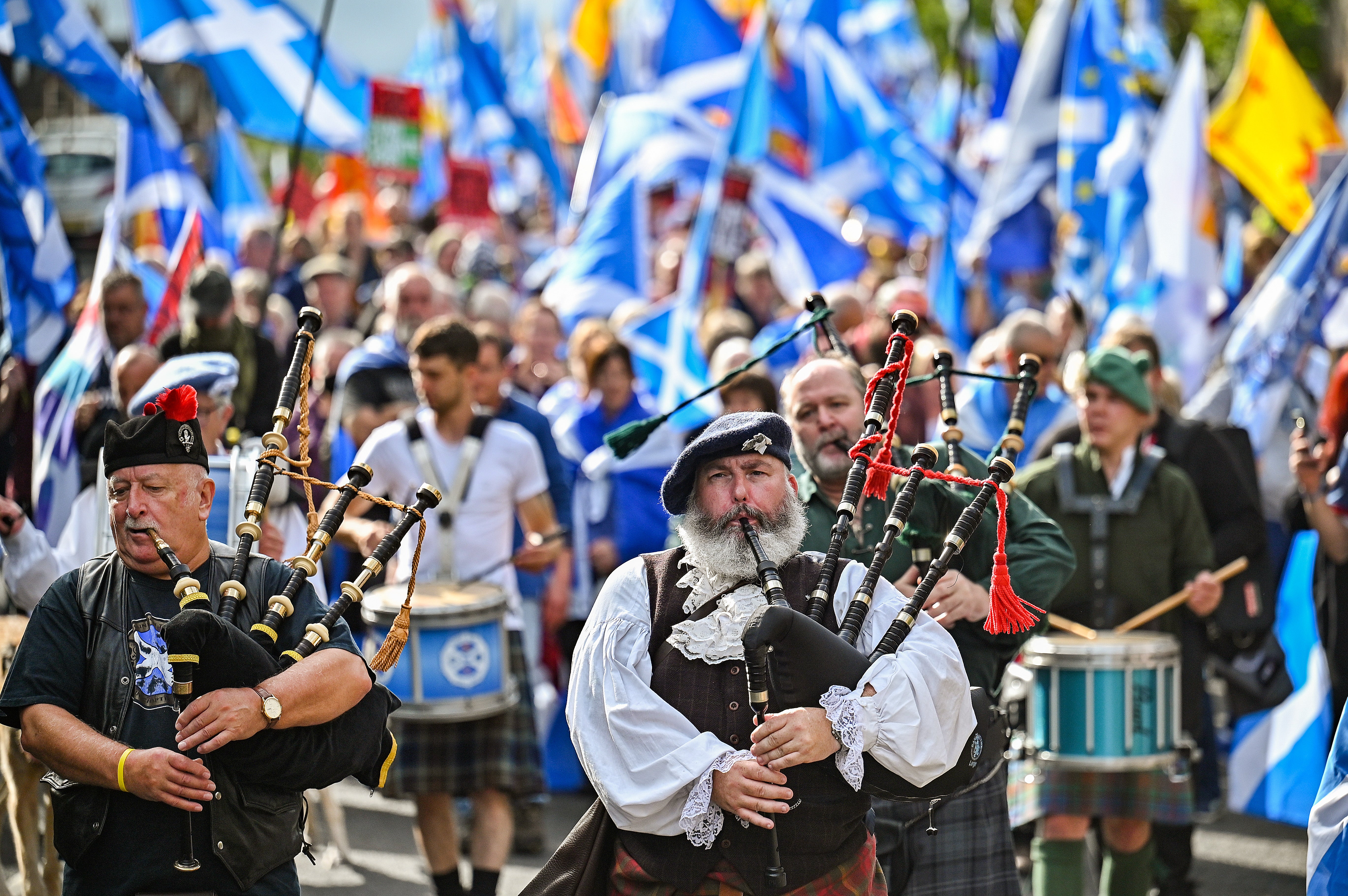 Supporters of Scottish independence hold a march outside the Scottish parliament in Edinburgh