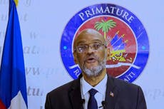 Haiti prime minister forced to flee ceremony after heavily armed gang members appear