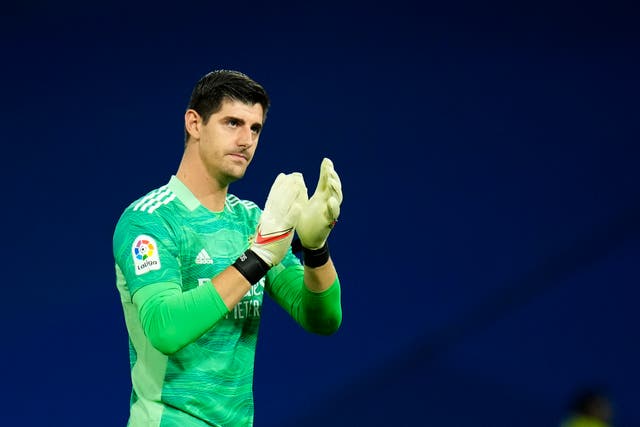 Real Madrid goalkeeper Thibaut Courtois made an important save in the first half (Manu Fernandez/AP)