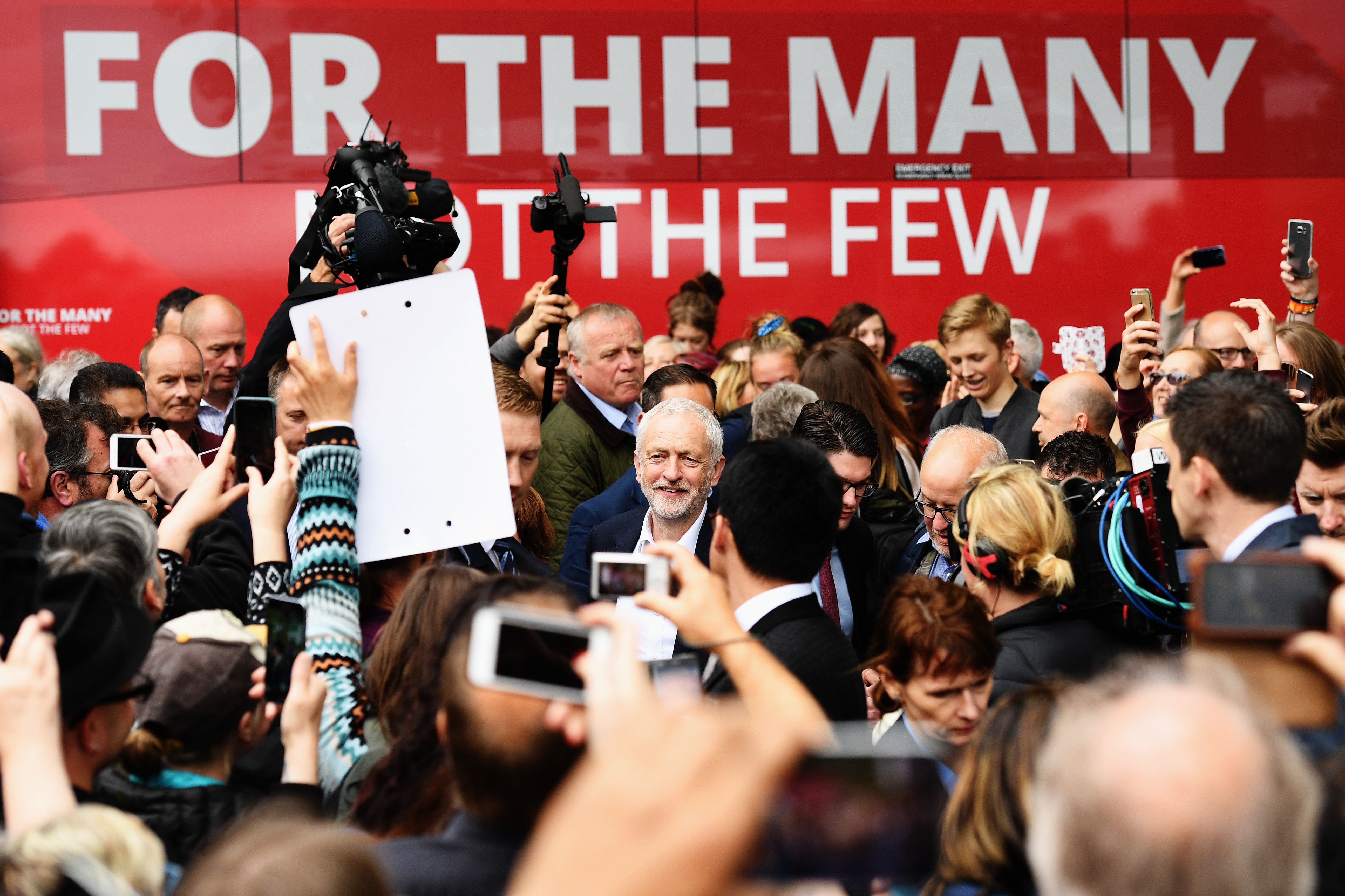 Former Labour Party leader Jeremy Corbyn is mobbed by supporters in 2017