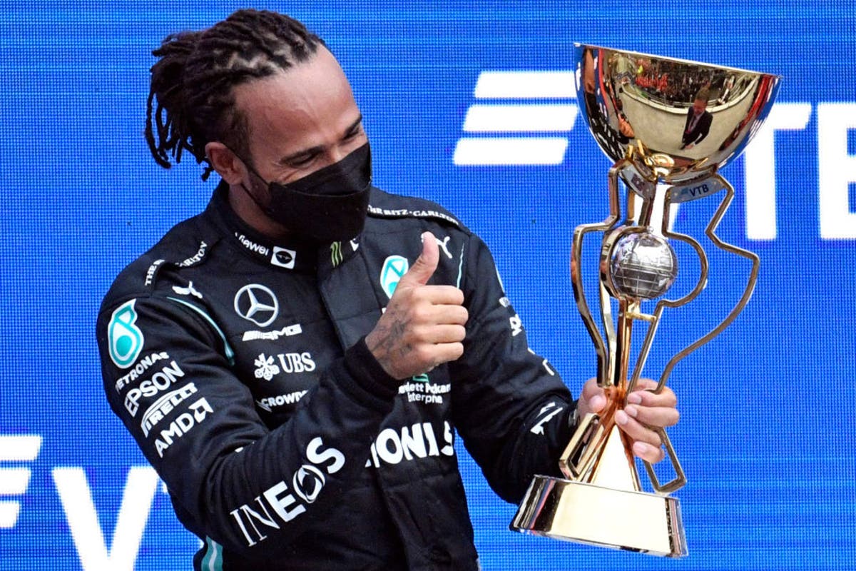 Lewis Hamilton wins 100th race as Lando Norris sees victory slip away in Sochi