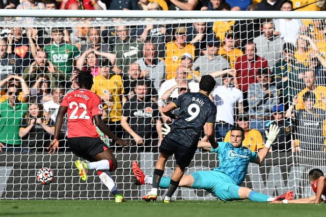 <p>Raul Jimenez beats Southampton goalkeeper Alex McCarthy  for the only goal of the game </p>