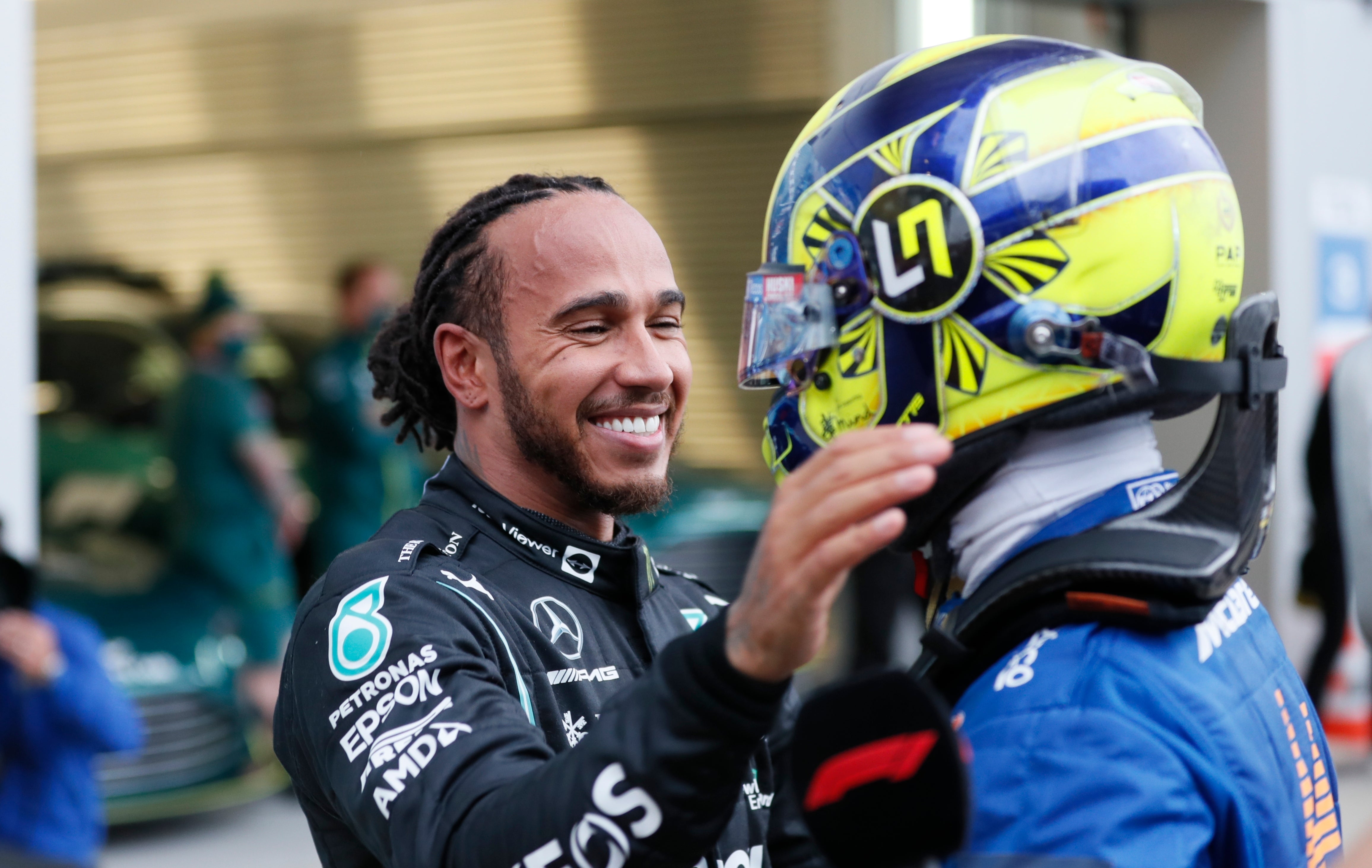 Lewis Hamilton consoles Lando Norris after the race (Yuri Kochetkov/AP)