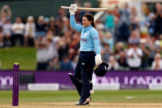 <p>Tammy Beaumont salutes the crowd</p>