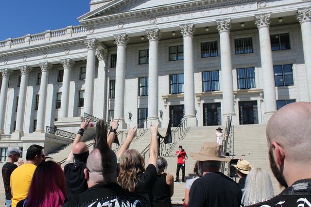 <p>Supporters of a religious reproductive rights rally organized by the Satanic Temple join in a “Hail Satan!” chant outside the Utah Capitol on Saturday, Sept. 25</p>