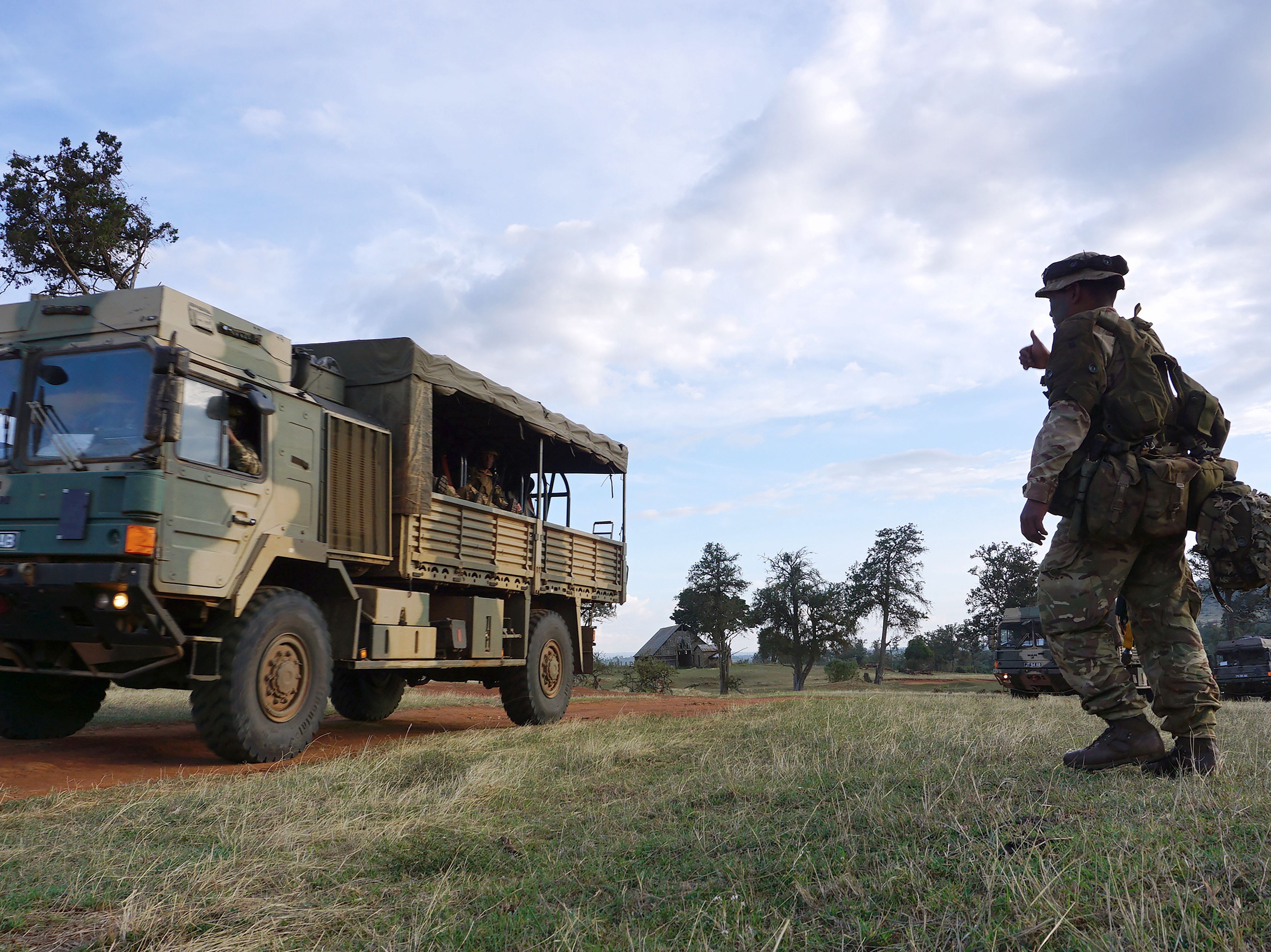 An unrelated photo shows soldiers taking part in a military excercise at the British Army Training Unit in Kenya