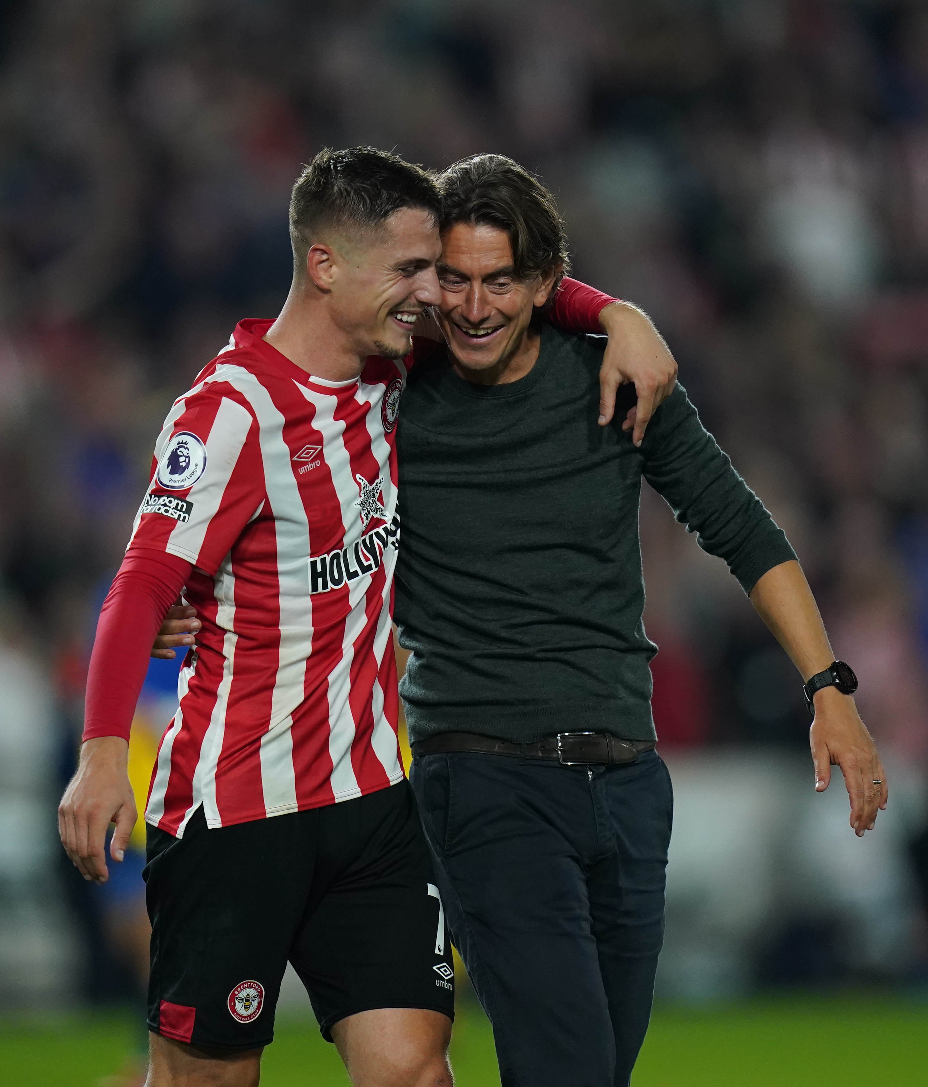 Brentford’s Sergi Canos and manager Thomas Frank celebrate their 3-3 draw with Liverpool (Adam Davy/PA)