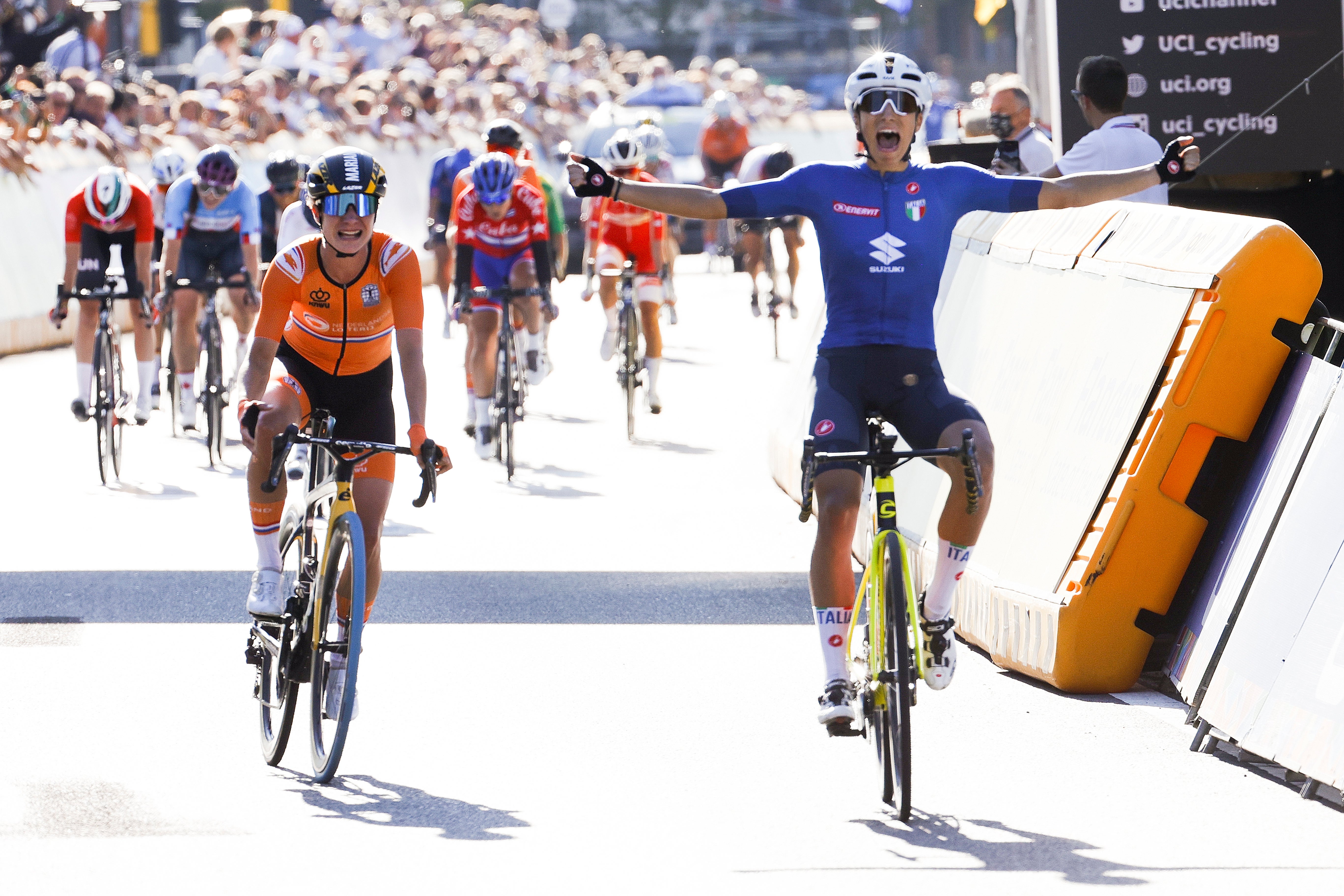 Elisa Balsamo of Italy crosses the finish line ahead of Marianne Vos to win the women’s road race at the World Road Cycling Championships (Olivier Matthys/AP)