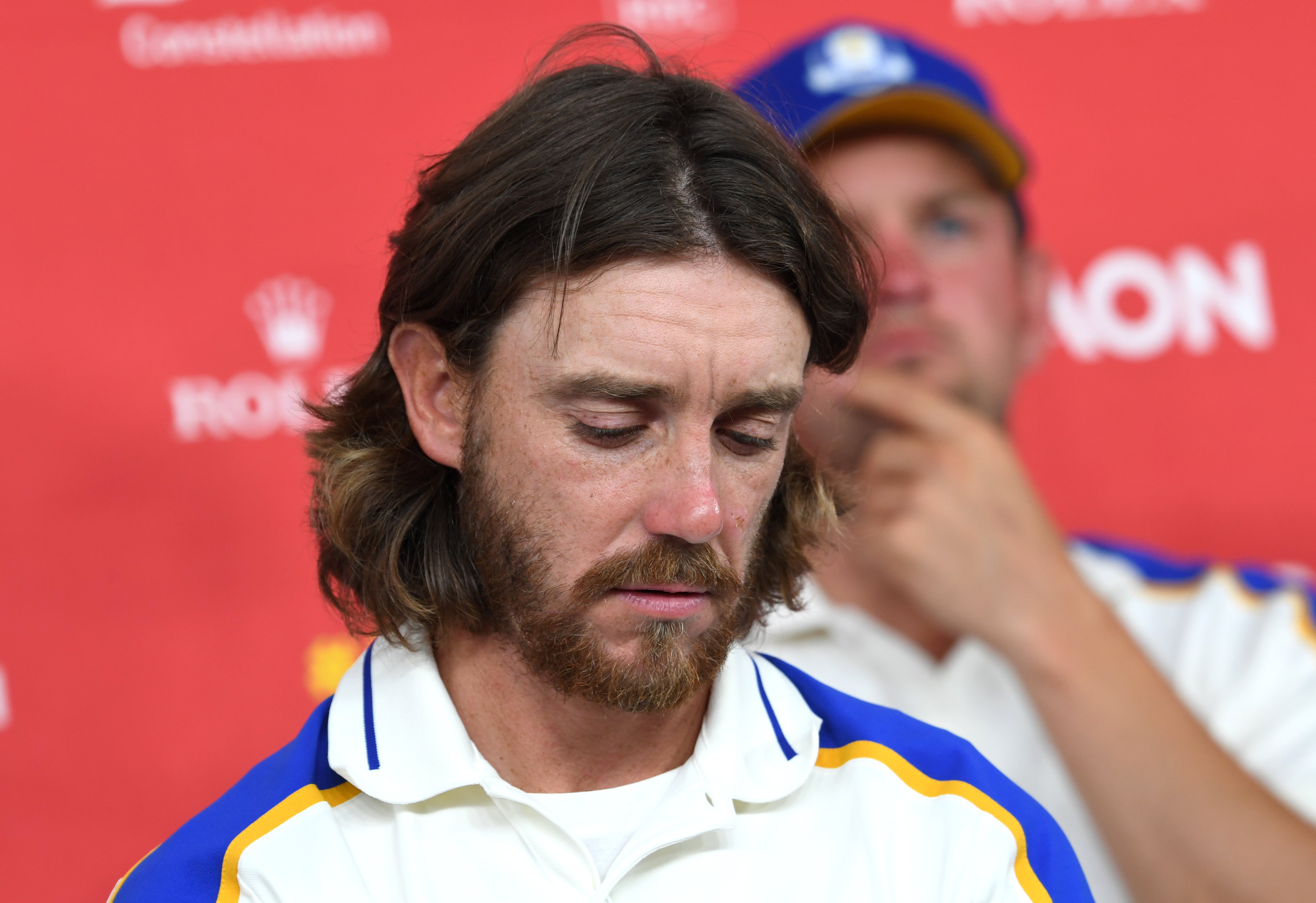 Europe’s Tommy Fleetwood looking downcast during a press conference after Europe’s Ryder Cup defeat (Anthony Behar/PA)