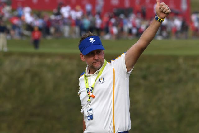 <p>Team Europe’s Ian Poulter acknowledges the crowd after his victory over Tony Finau (Anthony Behar/PA)</p>