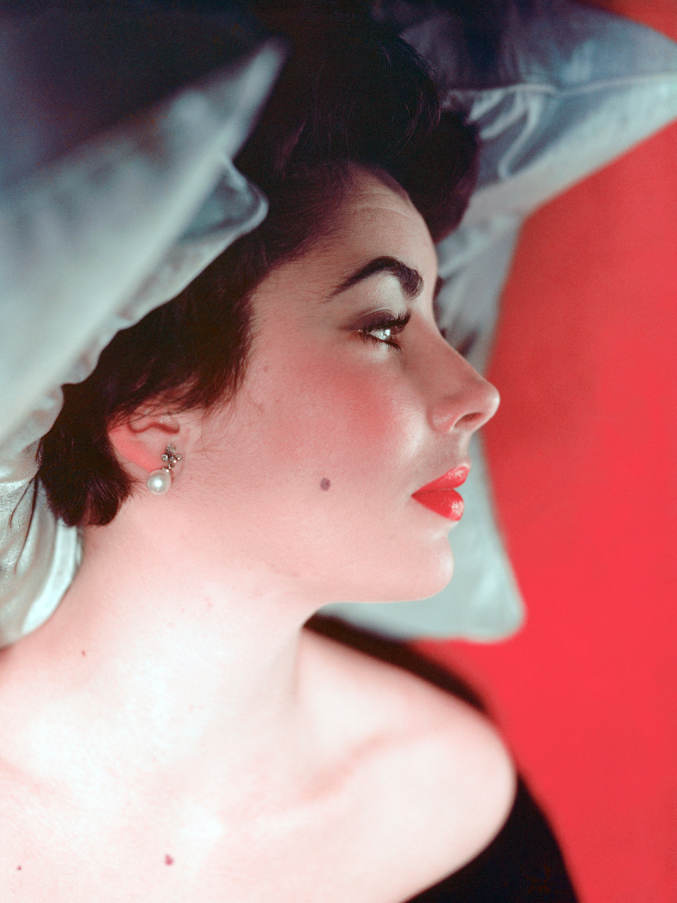 Elizabeth Taylor, photographed by acclaimed fashion photographer Norman Parkinson, in 1953