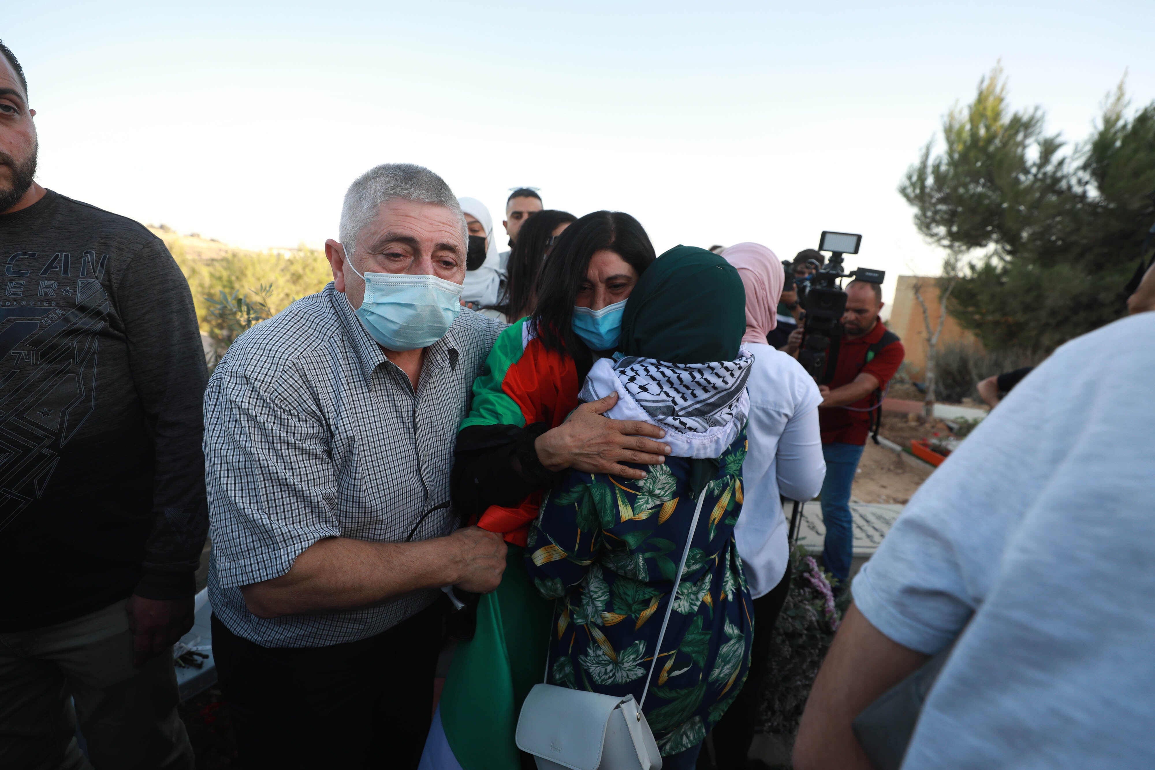 <p>Palestinian lawmaker Khalida Jarrar visits her daughter's grave after she passed away at age 31 from a cardiac arrest 3 months ago,  after her release on Sunday  from an Israeli prison in Ramallah  where she was held for years </p>