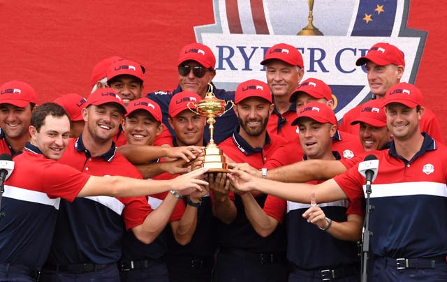 Team USA team celebrate with the Ryder Cup trophy after victory against Team Europe at Whistling Straits (Anthony Behar/PA)