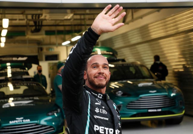 Lewis Hamilton celebrates his 100th career win (Yuri Kochetkov/AP)