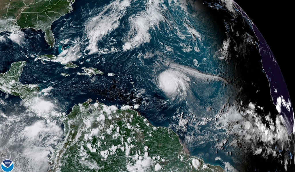 Hurricane Sam, small but mighty, swirls offshore in Atlantic
