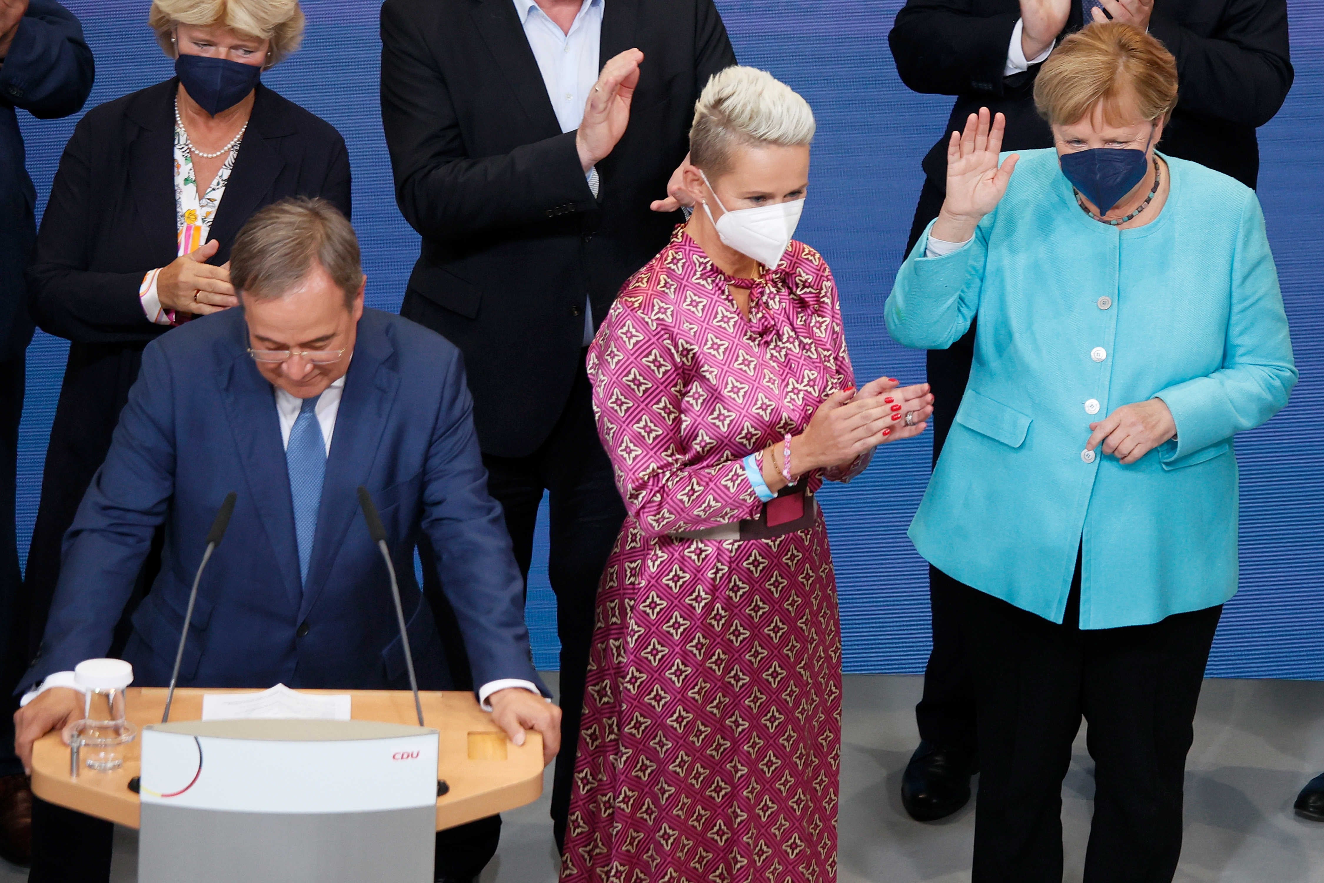 Laschet, Silvia Breher, deputy leader of the CDU, and Merkel during the elections