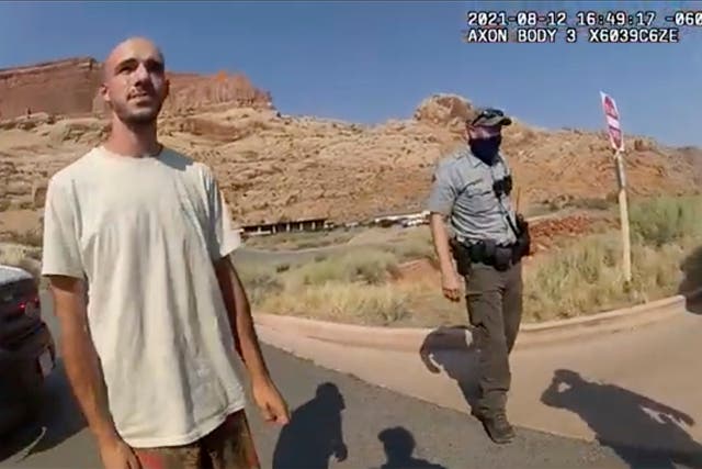 <p>Brian Laundrie talking to police in Utah on 12 August </p>