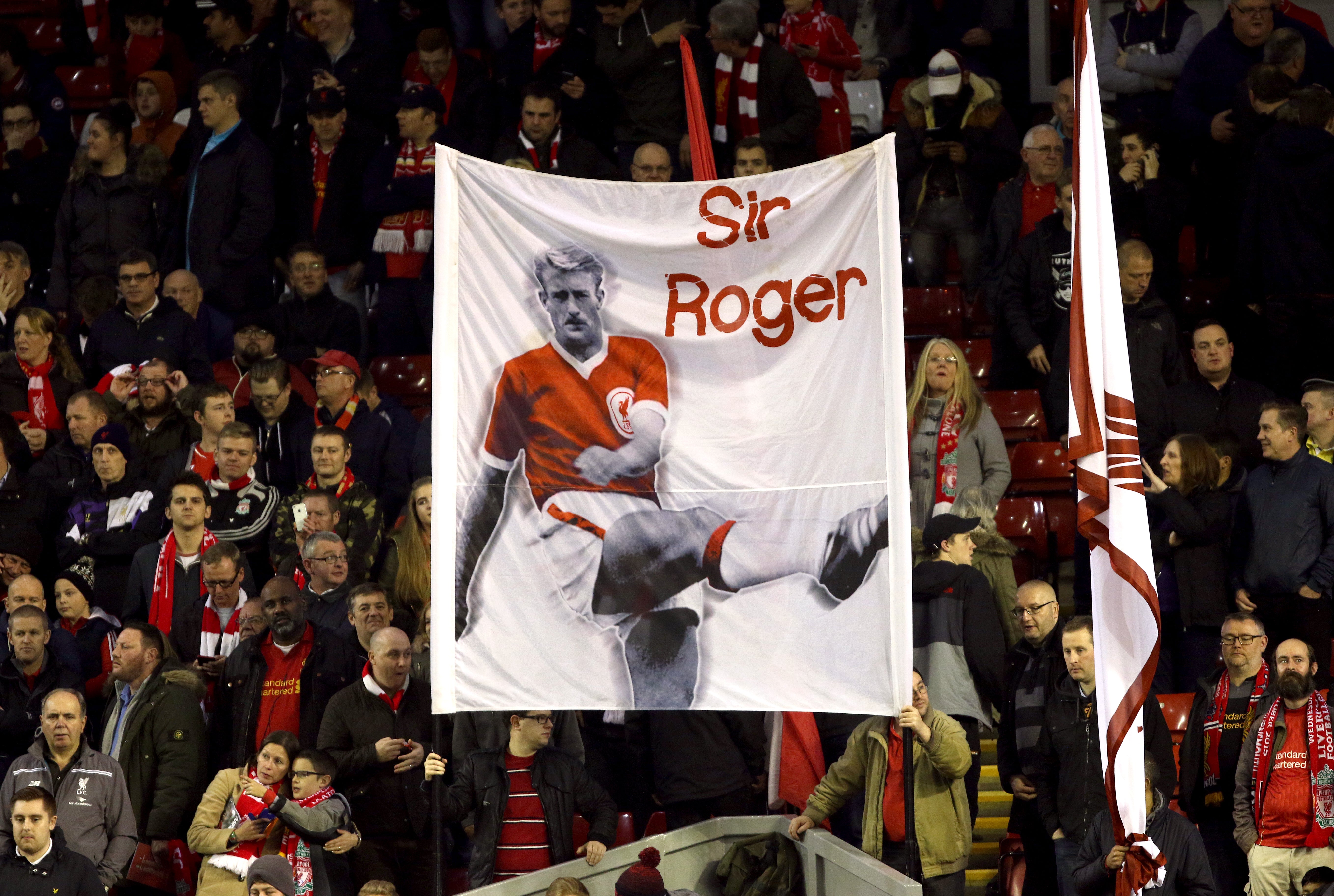Liverpool fans hold up a banner for their former player Hunt (Richard Sellers/PA)