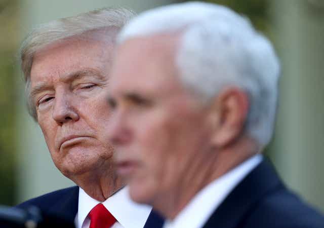 <p> Donald Trump listens as Vice president Mike Pence answers questions during the daily briefing of the coronavirus task force in the Rose Garden of the White House on April 27, 2020 in Washington, DC. </p>