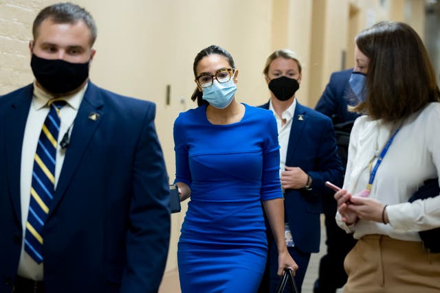 <p>Democratic Representative from New York Alexandria Ocasio-Cortez (C) arrives for a Democratic Caucus meeting on Capitol Hill in Washington, DC, USA, 28 September 2021</p>