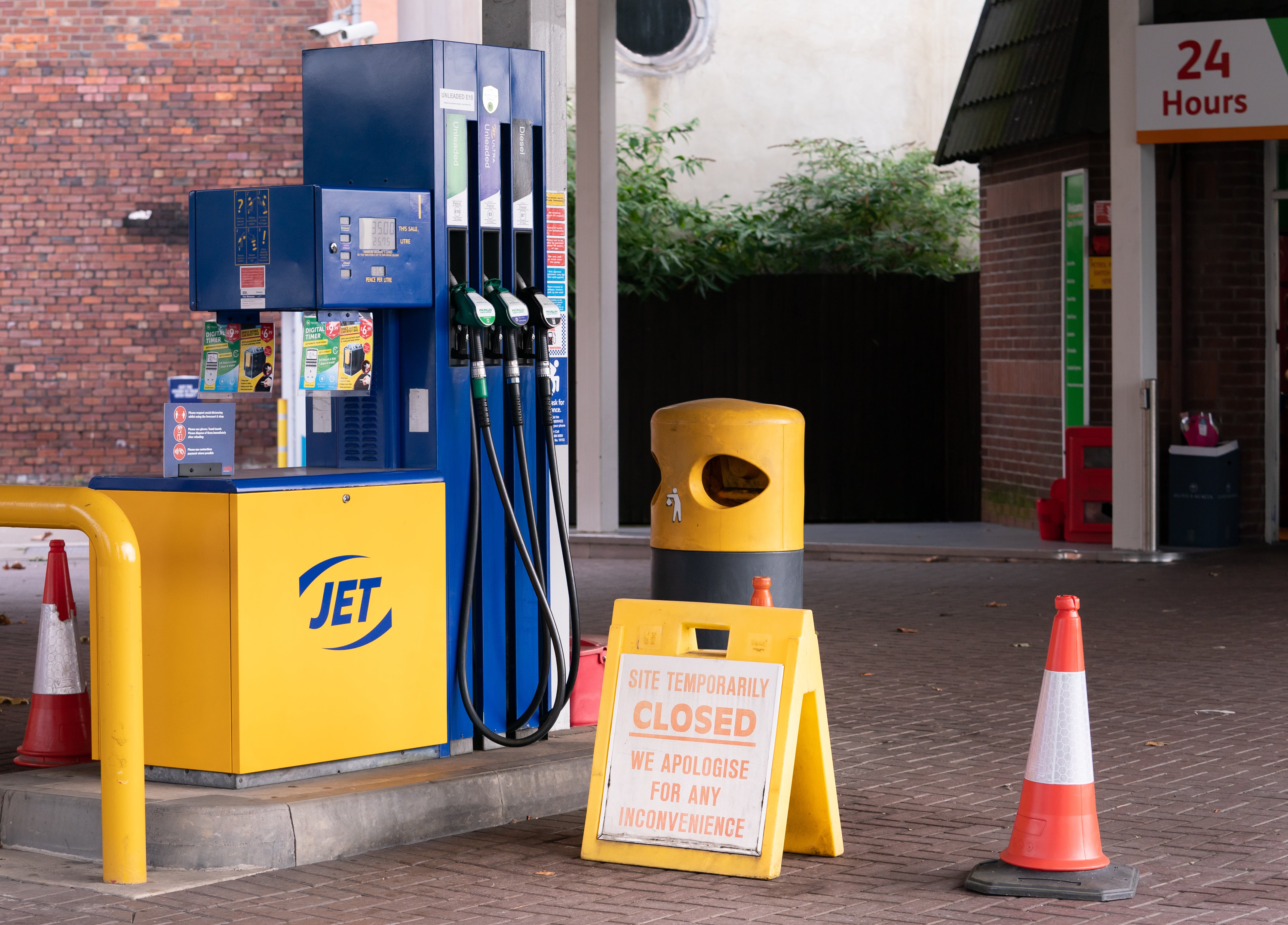 A closed sign on the forecourt of a petrol station in Leeds (Danny Lawson/PA)