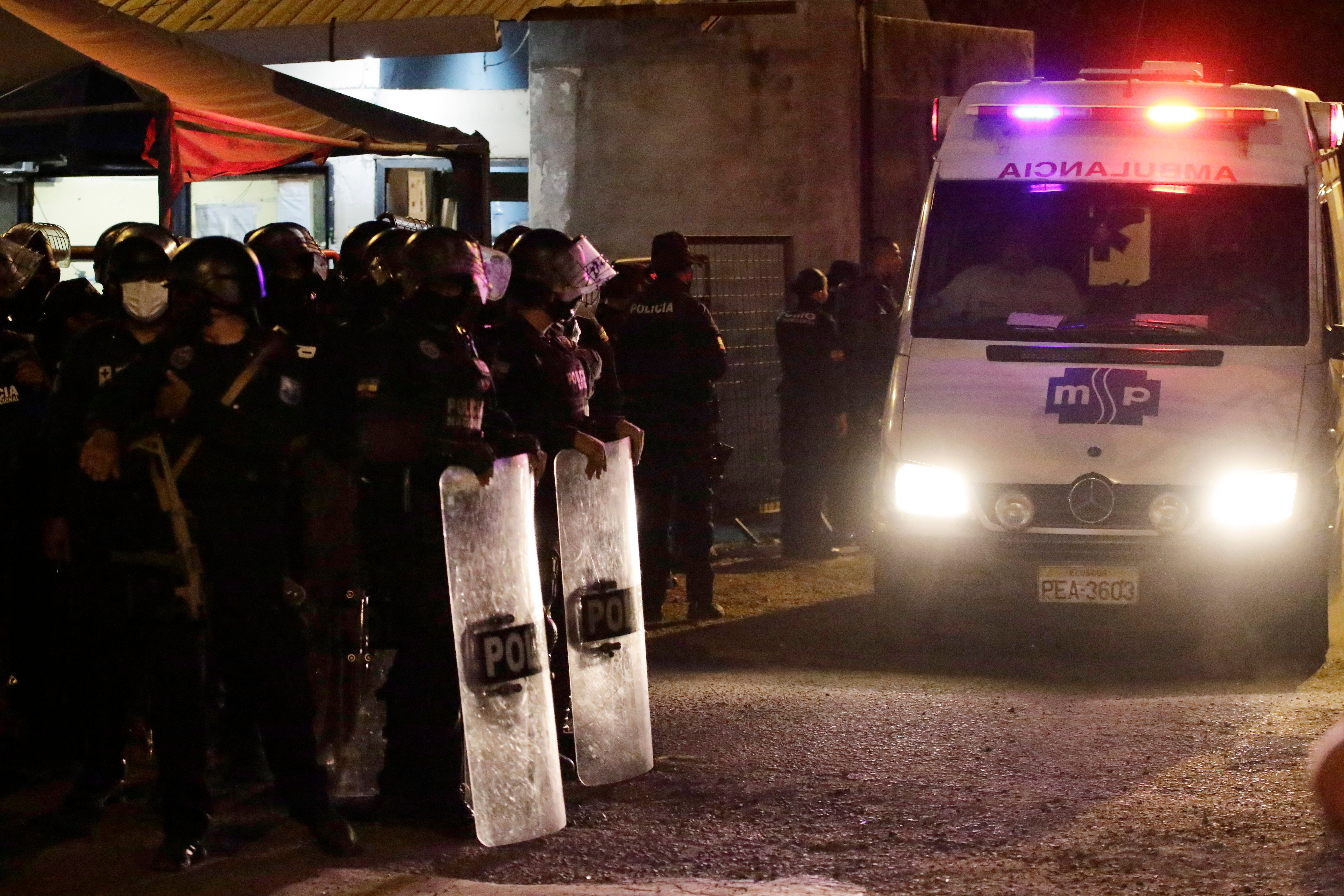 An ambulance leaves the Litoral Penitentiary in Guayaquil, Ecuador after a riot on Tuesday night