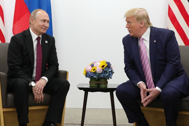 <p>(L) President Vladimir Putin (R) Former President Donald Trump </p>
