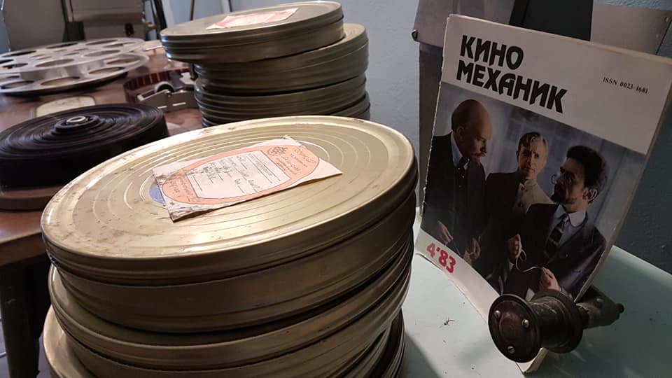 Reels stacked high in the projection room