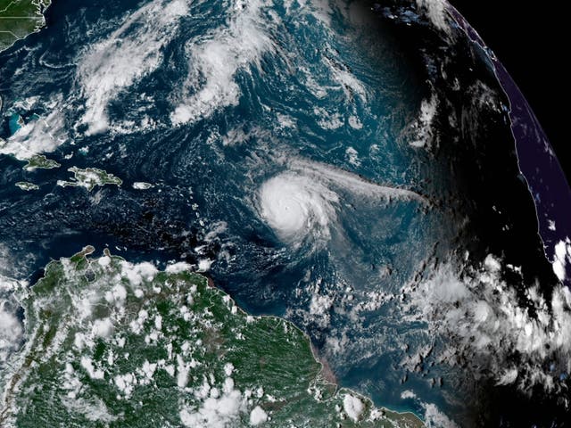 <p>This satellite image provided by the National Oceanic and Atmospheric Administration shows Hurricane Sam, just right of center, in the Atlantic Ocean, Monday, Sept. 27, 2021</p>